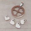 DIJE DE ACERO MEDALLA 26 MM C/ 4 CORAZONES CALADOS PARA GRABAR YPARTIR.