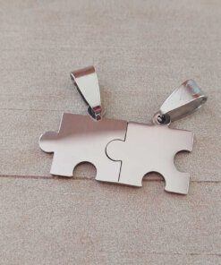 DIJE DE ACERO PUZZLE PARA PARTIR PULIDO. 33 X 19 MM