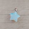 DIJE DE ACERO PIEDRA DE LA LUNA EN FORMA DE ESTRELLA. 20 MM