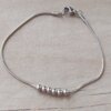 PULSERA DE ACERO COLA DE RATÓN CON BOLITAS. LARGO 19 CM