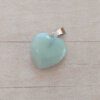 DIJE DE ACERO PIEDRA CUARZO VERDE EN FORMA DE CORAZÓN. 20 MM