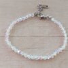 PULSERA DE TANZA CON MOSTACILLAS TORNASOL Y TERMINAL DE ACERO.  LARGO 18 + 3.5 CM  EXT.