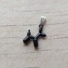 DIJE DE ACERO PERRITO NEGRO. TAMAÑO 17 MM