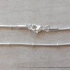 CADENA DE ACERO BLANCO COLA DE RATÓN CON BOLITAS INTERCALADAS.