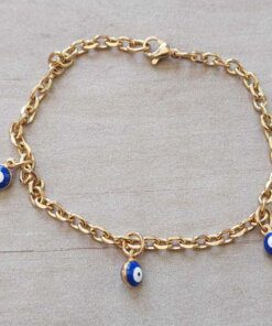 PULSERA DE ACERO DORADO ESLABÓN TIFFANY DIAMANTADA CON OJITOS AZULES ESMALTADOS COLGANTES. LARGO 19 CM