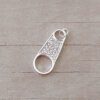 DIJE DE ACERO BLANCO CIERRE CON STRASS BLANCO. MEDIDAS 10 X 24 MM