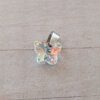 DIJE DE ACERO MARIPOSA 15 MM X 12 MM DE ACRÍLICO TORNASOLADO.