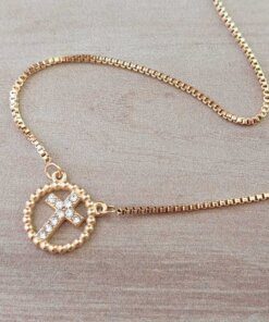 COLGANTE DE ACERO DORADO ESLABÓN VENECIANA CON CENTRO CRUZ C/STRASS. LARGO 38 + 4 CM EXT.