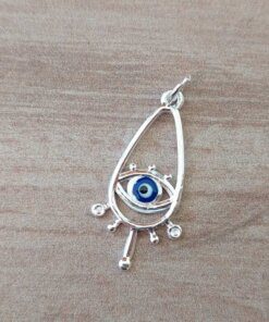 DIJE DE ACERO BLANCO LAGRIMA CALADA CON OJO TURCO INTERIOR. 12 X 30 MM