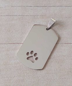 DIJE DE ACERO MEDALLA PARA GRABAR PULIDA EN UNA SOLA CARA CON HUELLA CALADA. MEDIDAS 24 X 39 MM