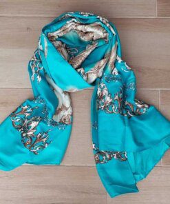 PASHMINA RASADA TURQUESA CON DIBUJOS BEIGE . 85 X 180 CM.