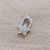 DIJE DE ACERO ESTRELLA CANDADO CON STRASS BLANCO. 12 X 17 MM