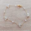 PULSERA DE ACERO DORADO FORCET CON CORAZONES DE ACRÍLICO Y BOLITAS. LARGO 19 CM
