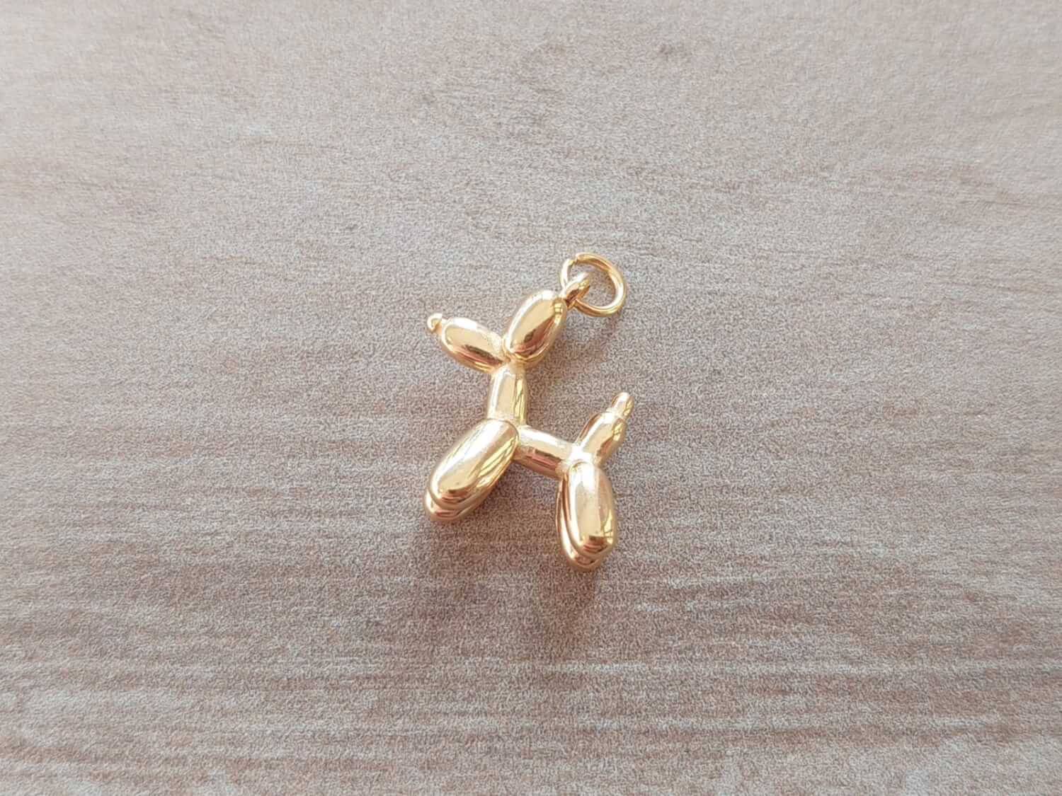 DIJE DE ACERO DORADO PERRO GLOBO BOMBE 15 X 18 MM