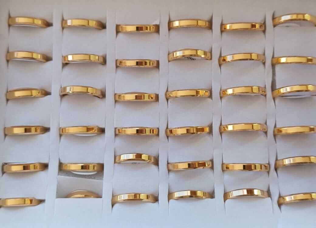 ANILLO ALIANZA DE ACERO DORADO LISA 4 mm X 36 UNIDADES. (MEDIDAS DEL 17 AL 22)