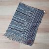 PASHMINA TRAMADA FORMAS ZIG ZAG TONALIDADES NEGRO. 70 X 180 CM.