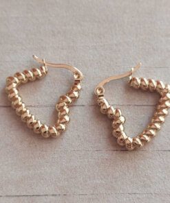 ARO DE ACERO DORADO ARGOLLA HUECA CON FORMA DE CORAZON RETORCIDO. TAMAÑO 22 X 20 MM