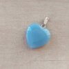 DIJE DE ACERO PIEDRA AZULINO EN FORMA DE CORAZÓN. 20 MM