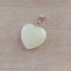 DIJE DE ACERO PIEDRA AMARILLA EN FORMA DE CORAZÓN. 20 MM
