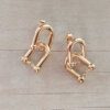 ARO DE ACERO DORADO TIFFANY CON FRU FRU. TAMAÑO 12 X 28 MM