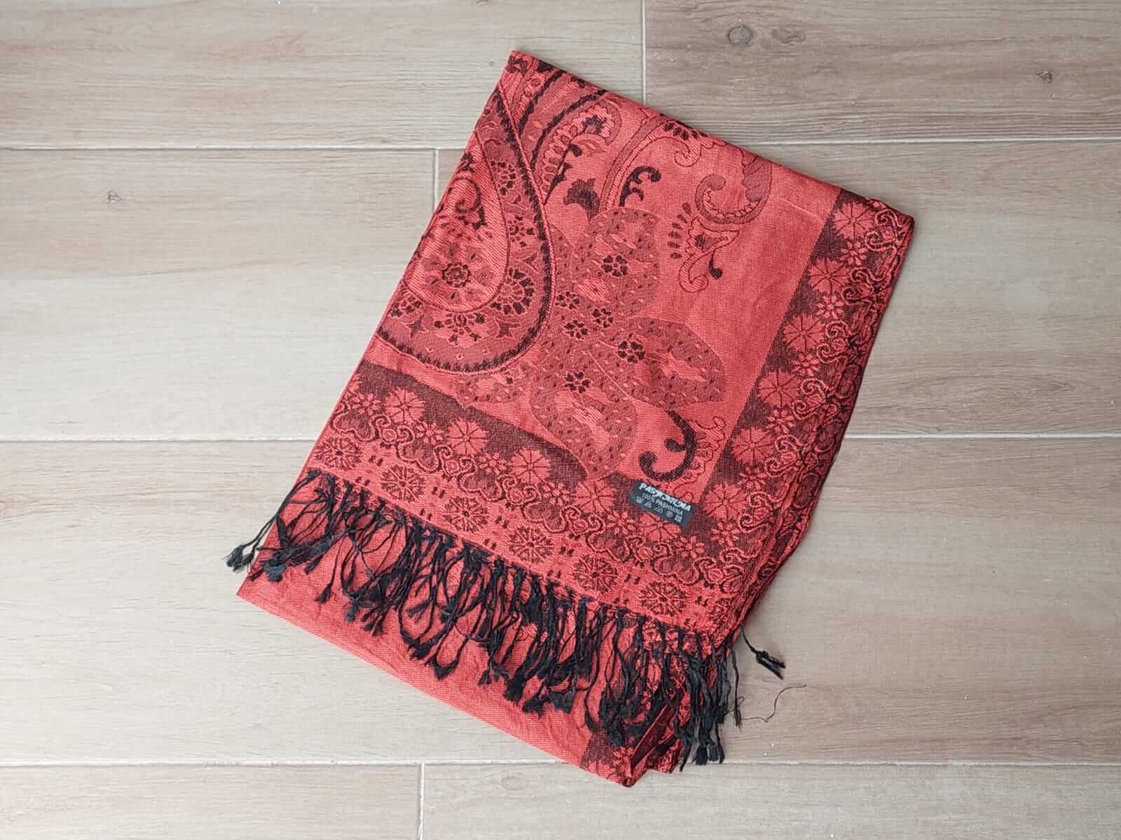 PASHMINA BÚLGARA NARANJA CON FLORES Y GUARDA DE BORDE . 70 X 180 CM.