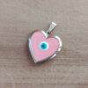 DIJE DE ACERO RELICARIO CORAZÓN ESMALTADO COLOR ROSA CON OJITO TURCO EN EL CENTRO. TAMAÑO 22 MM