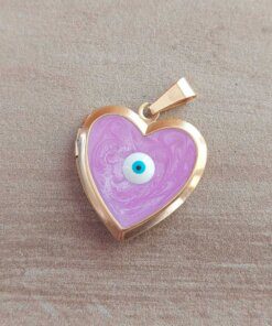 DIJE DE ACERO DORADO RELICARIO CORAZÓN ESMALTADO COLOR LILA CON OJITO TURCO EN EL CENTRO. TAMAÑO 22 MM