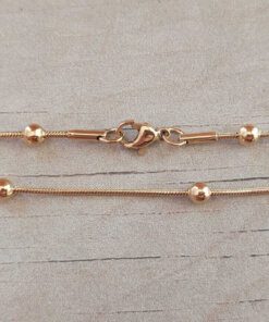 CADENA DE ACERO DORADO CLAPTON 1,2 CON BOLITAS DE 4 MM.