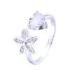 ANILLO PLATA ABIERTO CORAZÓN Y FLOR CON ZIRCONES. PESO 2.31 GRS.