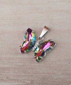DIJE DE ACERO MARIPOSA DE ACRÍLICO BOREAL. 15 X 20 MM
