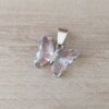 DIJE DE ACERO MARIPOSA DE ACRÍLICO ROSA. 15 X 20 MM