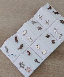 BLISTER DE AROS DE ACERO FIGURA PULIDA CON ESPESOR X 12 PARES EN ALMOHADILLA EXHIBIDORA