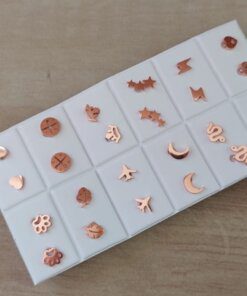 BLISTER DE AROS DE ACERO ROSE FIGURA PULIDA CON ESPESOR X 12 PARES EN ALMOHADILLA EXHIBIDORA