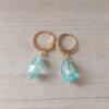 ARO DE ACERO DORADO BRISURA CON LAGRIMA AQUA. LARGO TOTAL 29 MM.