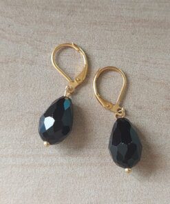 ARO DE ACERO DORADO BRISURA CON LAGRIMA NEGRA. LARGO TOTAL 32 MM.