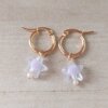 ARO DE ACERO DORADO ARGOLLA 15 MM CON DIJE ESTRELLA ACRÍLICO LILA.