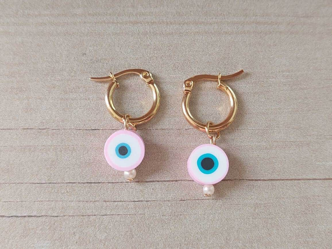 ARO DE ACERO DORADO ARGOLLA 15 MM CON DIJE OJO TURCO ROSA.