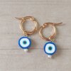 ARO DE ACERO DORADO ARGOLLA 15 MM CON DIJE OJO TURCO AZUL.