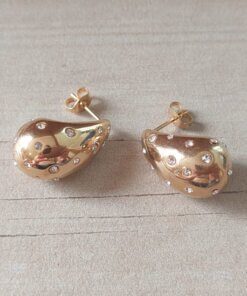 ARO DE ACERO DORADO CON STRASS, TIPO GOTA CON FRU FRU. TAMAÑO 22 X 14 MM