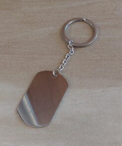 LLAVERO DE ACERO CON DIJE RECTANGULAR PARA GRABAR 28 X 47 MM PULIDO EN AMBAS CARAS. LARGO TOTAL 110 MM