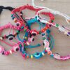 PULSERA HILO AJUSTABLE COLORES SURTIDOS CON OJO TURCO Y SEMILLAS ENHEBRADOS. PACK X 12 UNIDADES SURTIDAS.
