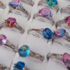 ANILLOS DE ACERO X 36 UNIDADES CON CUBIK FORMAS DISTINTAS Y SURTIDOS EN MEDIDAS Y EN COLOR (TORNASOL). (MEDIDAS DEL 18 AL 21)