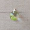 DIJE DE ACERO BLANCO ACRÍLICO VERDE 15 MM. BRILLA EN LA OSCURIDAD.