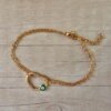 PULSERA DE ACERO DORADO ESLABÓN ESPEJITO DOBLE CON CENTRO CORAZÓN CALADO CON OJO VERDE. LARGO 17,5 + 3 CM EXT.