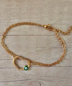 PULSERA DE ACERO DORADO ESLABÓN ESPEJITO DOBLE CON CENTRO CORAZÓN CALADO CON OJO VERDE. LARGO 17,5 + 3 CM EXT.