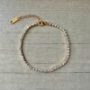 PULSERA DE ACERO DORADO TIRA DE STRASS 3 MM COLOR BLANCO. LARGO 18 + 3 CM EXT.