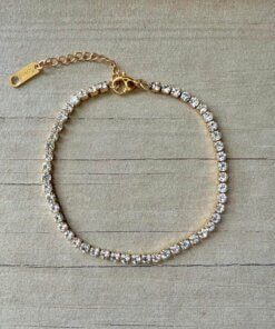 PULSERA DE ACERO DORADO TIRA DE STRASS 3 MM COLOR BLANCO. LARGO 18 + 3 CM EXT.