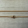 CADENA DE ACERO DORADO GRUMET 0.4. Paquete x 10 unidades