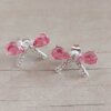 ARO DE ACERO BLANCO MOÑO CON STRASS Y CUBIK FUCSIA. MEDIDAS 18 X 11 MM