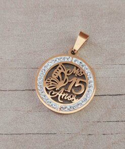 DIJE DE ACERO DORADO 15 AÑOS CON STRASS. TAMAÑO 22 MM